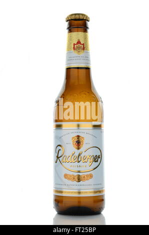 Radeberger pilsner beer isolated on white background. Radeberger has been brewed since 1872 in Germany. Stock Photo