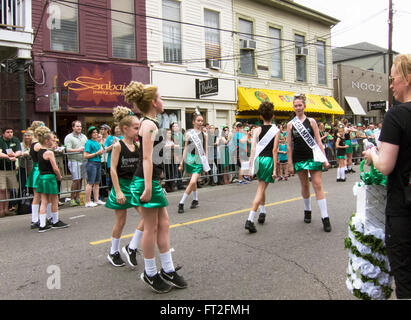 Teenage girls performing an Irish jig on Magazine St. during the New Orleans St. Patrick's Day parade. Stock Photo
