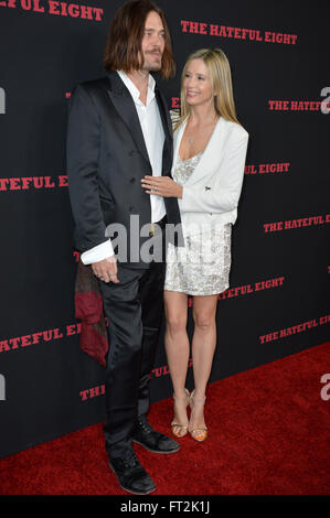 LOS ANGELES, CA - DECEMBER 7, 2015: Actress Mira Sorvino & husband Christopher Backus at the world premiere of Quentin Tarantino's 'The Hateful Eight' at the Cinerama Dome, Hollywood Stock Photo