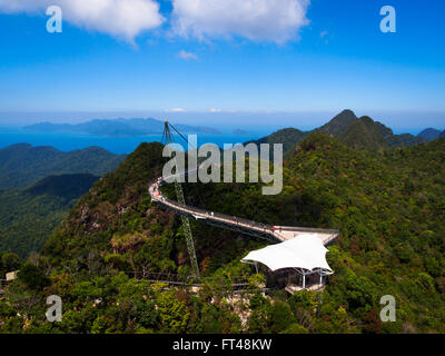 The dramatic sky bridge suspended over a gorger at the peak of Mount Machinchang on Langkawi Island, Kedah, Malaysia. Stock Photo