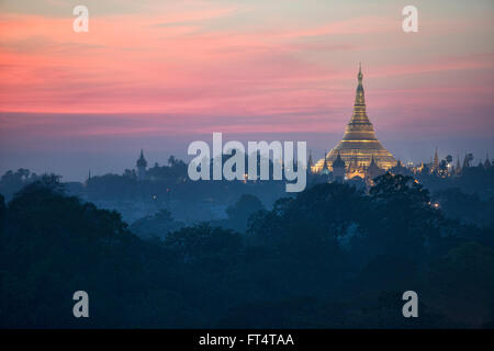 Golden Shwedagon Pagoda at sunset, Yangon, Myanmar Stock Photo