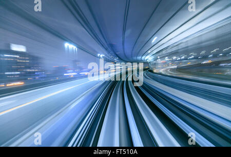 Motion blur of train moving inside tunnel in Tokyo, Japan Stock Photo