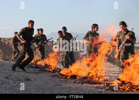 Recruits with the Kurdish YPG during training shown in a propaganda photo released by the YPG March 24, 2016 in Iraqi Kurdistan. The YPG or Peoples Protections Units are fighting the Islamic State in Syria and Iraq. Stock Photo