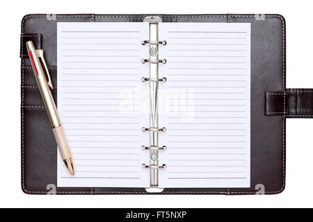 opened brown leather notebook and ballpoint pen Stock Photo