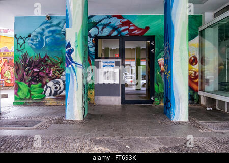 Berlin Kreuzberg Street art. Entrance to dental practice with mural art and graffiti Stock Photo