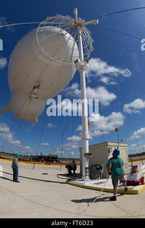 Rio Grande City, TX - The Tethered Aerostat Radar System (TARS) is low-level airborne ground surveillance system that uses aerostats (moored balloons) as radar platforms.  U.S. Customs and Border Protection, Air and Marine Operations use the TARS to provide persistent, long-range detection and monitoring (radar surveillance) capability for interdicting low-level air, maritime and surface smugglers and narcotics traffickers. Photographer: Donna Burton Stock Photo