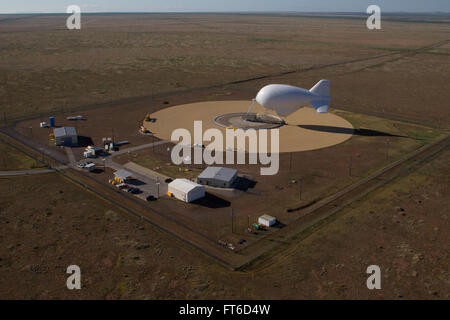 : Marfa, TX - The Tethered Aerostat Radar System (TARS) is low-level airborne ground surveillance system that uses aerostats (moored balloons) as radar platforms.  U.S. Customs and Border Protection, Air and Marine Operations use the TARS to provide persistent, long-range detection and monitoring (radar surveillance) capability for interdicting low-level air, maritime and surface smugglers and narcotics traffickers. Photographer: Donna Burton Stock Photo