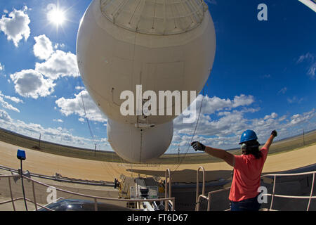 Marfa, TX - The Tethered Aerostat Radar System (TARS) is low-level airborne ground surveillance system that uses aerostats (moored balloons) as radar platforms.  U.S. Customs and Border Protection, Air and Marine Operations use the TARS to provide persistent, long-range detection and monitoring (radar surveillance) capability for interdicting low-level air, maritime and surface smugglers and narcotics traffickers. Photographer: Donna Burton Stock Photo