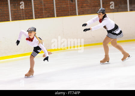 BARCELONA - MAY 03: Young team from a school of skating on ice performs at the International Cup Ciutat de Barcelona. Stock Photo