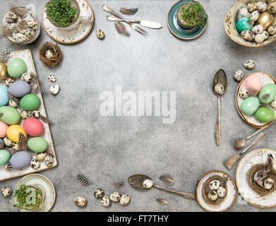 Easter composition with colored eggs and decorations. Top view Stock Photo