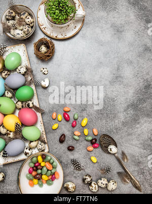 Easter decoration with eggs and sweets. Top view Stock Photo