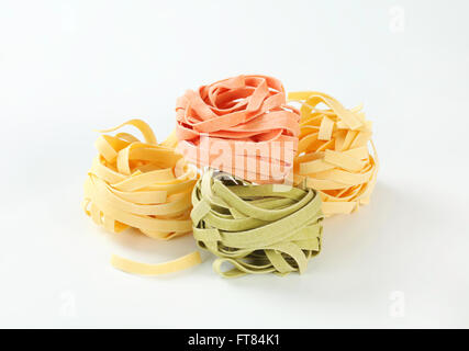 Bundles of dried ribbon pasta Stock Photo