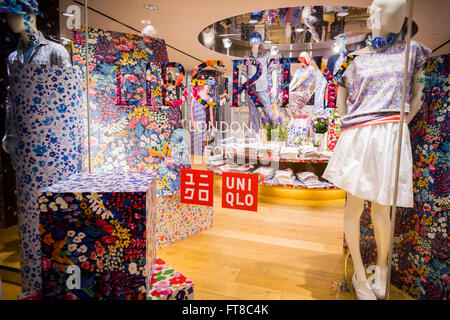 The Uniqlo store on Fifth Avenue in New York on Thursday, March 24, 2016 featuring the merchandise in the collaboration between Uniqlo and Liberty London, a company known mostly for its distinctive floral patterned fashions. (© Richard B. Levine) Stock Photo