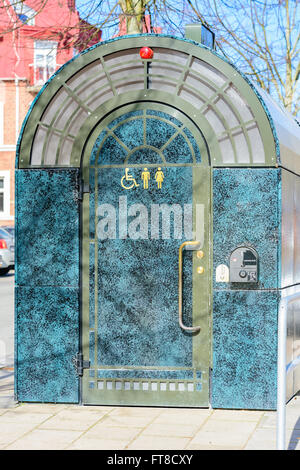 Kristianstad, Sweden - March 20, 2016: A public toilet free of charge as a service to strollers in the city. The door signs tell Stock Photo