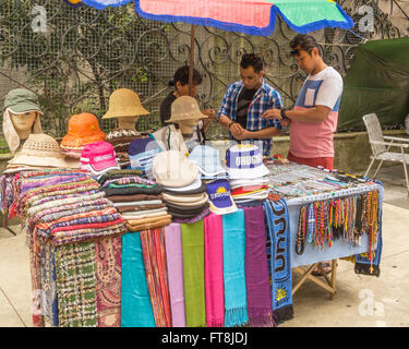 STREET VENDOR, MONTIVIDEO, URUGUAY - CIRCA DECEMBER 2015. A street vendor selling merchandise to tourists. Stock Photo