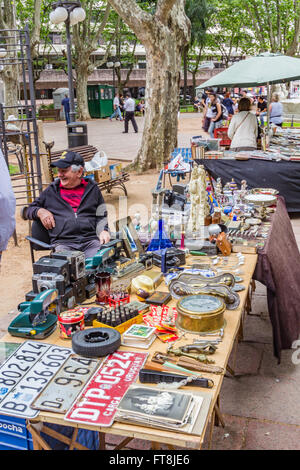 STREET VENDOR IN CONSTITUTION PLAZA, MONTIVIDEO, URUGUAY - CIRCA DECEMBER 2015. A multitude of arts, crafts, and scond-hand item Stock Photo