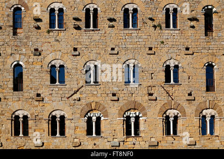 Classic windows in an old stone building Stock Photo