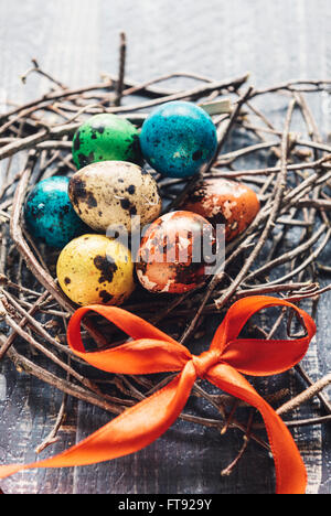 Colorful Easter eggs in the nest,selective focus Stock Photo