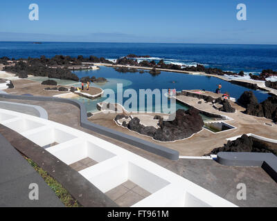 Porto Moniz, natural volcanic swimming pools on beach amongst rocks, Madeira, March 2016 Stock Photo