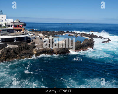 Porto Moniz, natural volcanic swimming pools on beach amongst rocks, Madeira, March 2016 Stock Photo