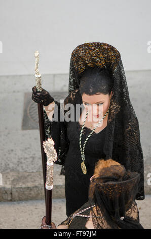 Mijas, Andalusia, Spain. 25 march 2016. Good Friday procession in Andalusian white village of Mijas, women dressed in traditional 'mantilla black veils'. Malaga Province. Credit:  Perry van Munster/ Alamy Live News Stock Photo
