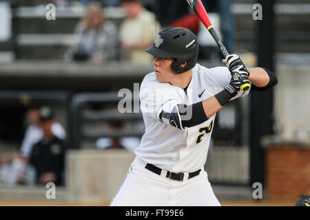 Gavin Sheets (24) of the Wake Forest Demon Deacons puts on the brakes after  rounding second base during the game against the West Virginia Mountaineers  in Game Six of the Winston-Salem Regional