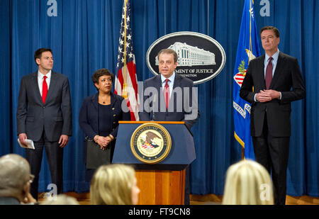 United States Attorney Preet Bharara of the Southern District of New York makes opening remarks at a press conference at the Department of Justice in Washington, DC on Thursday, March 24, 2016. They announced criminal charges against seven individuals working on behalf of the Iranian government for conducting cyber attacks against the US financial sector and the Bowman Dam in Rye, NY. From left to right: Assistant Attorney General for National Security John Carlin; US Attorney General Loretta Lynch; US Attorney Bharara; and FBI Director James Comey. Credit: Ron Sachs/CNP (RESTRICTION: NO New Stock Photo