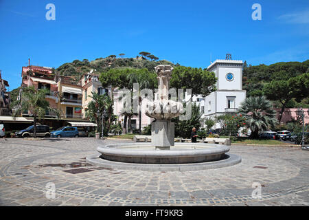 Lacco Ameno, Italy - August 11, 2015: Fountain on the square piazza S.Restituta in Lacco Ameno town, Ischia, Italian island Stock Photo