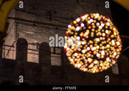 A big lights ball during Christmas in Bologna street