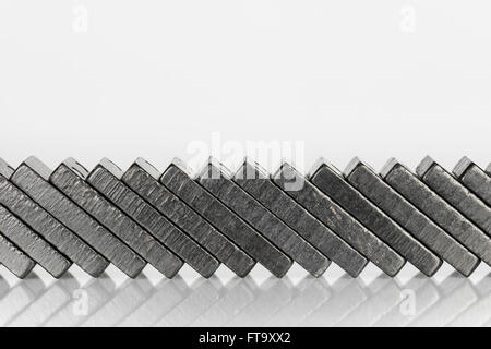 Composition of lying black domino bricks with white dots Stock Photo