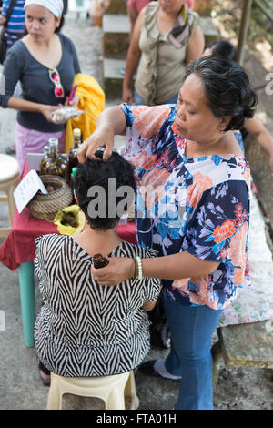 Traditional Practices being used by Healers on the Island of Siquijor,Philippines at the annual Healing Festival Stock Photo