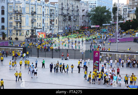 Football fans go to the Olympic stadium (NSC Olimpiysky) before UEFA EURO 2012 game between Ukraine and Sweden Stock Photo