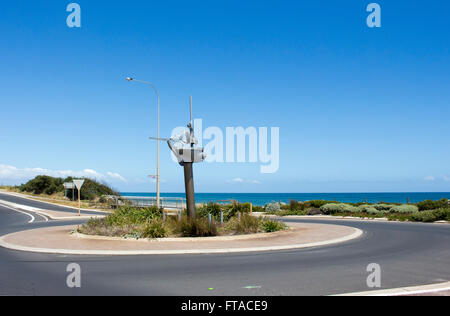 Roundabout on Ocean Beach Bunbury South Western Australia is a half boat with Mrs Scott's washing hanging on a line. Stock Photo