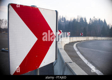 Signal turn right on country road Stock Photo