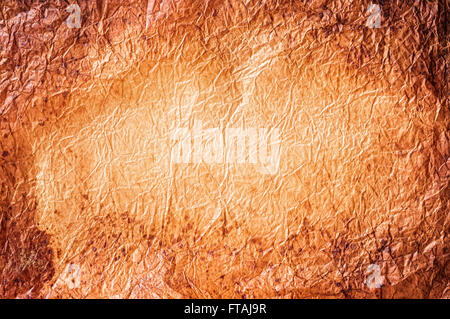 Parchment paper background with dark corners. Stock Photo