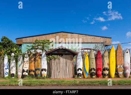 A fence made out of windsurfing boards: unique, fun, local travel sights in Paia, Maui, Hawaii Stock Photo