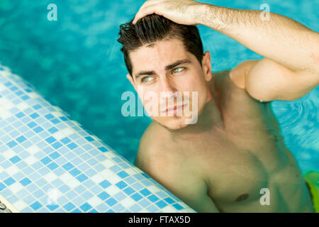 Face of the man floating in the pool Stock Photo