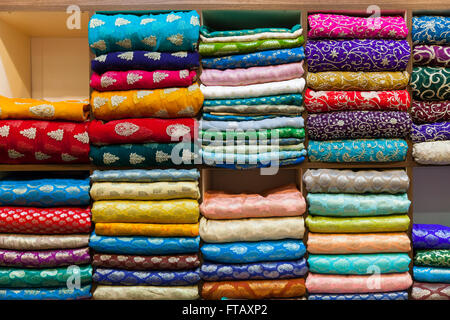 Colorful Indian and Asian sari fabric in retail display Stock Photo