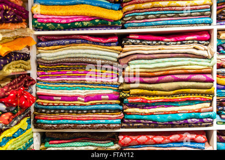 Colorful Indian and Asian sari fabric and textiles on display Stock Photo