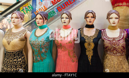 Shop mannequins in Indian dresses and saris in retail display Stock Photo