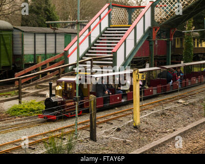 Miniature steam train rides at Betws-y-Coed Railway Station Conwy North Wales on the site of the old railway goods yard school holiday attraction Stock Photo