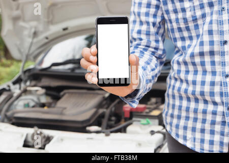 man showing phone blank screen call emergency service concept Stock Photo