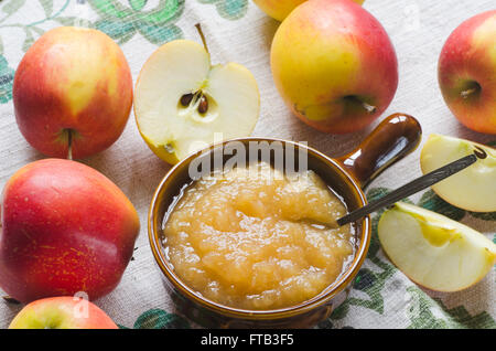 fresh apples and apple jam on table Stock Photo