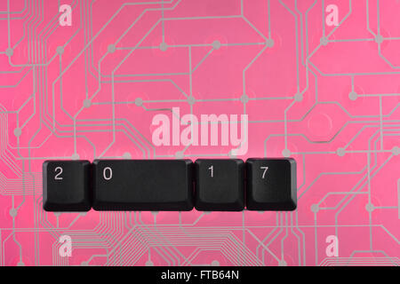 Happy new year 2017 message, keys on the computer background Stock Photo