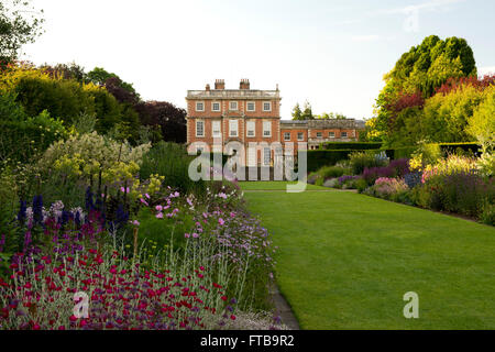 The double herbaceous borders at Newby Hall in Ripon, North Yorkshire, UK  the house was orginally designed by Christopher Wren. Stock Photo