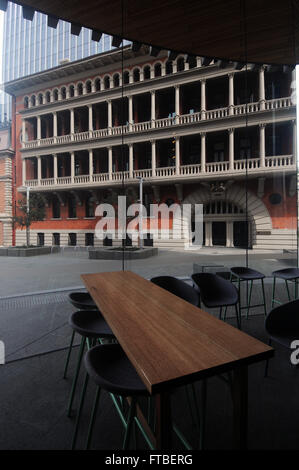 View through windows of the new City of Perth Library towards the COMO Hotel in renovated Treasury Building, Cathedral Square Stock Photo