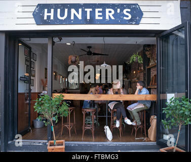 Two people chat in a restaurant in Brooklyn, New York City. Stock Photo