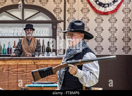 Graeagle, California, USA-  A member of The Nevada Gunfighters Wild West Theatrical Group talks to the audience. Stock Photo