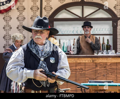 Graeagle, California, USA-  A member of The Nevada Gunfighters Wild West Theatrical Group talks to the audience. Stock Photo