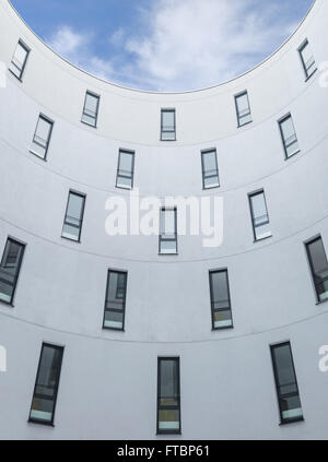 Modern office building design concrete wall and windows vertical perspective stock photo Stock Photo